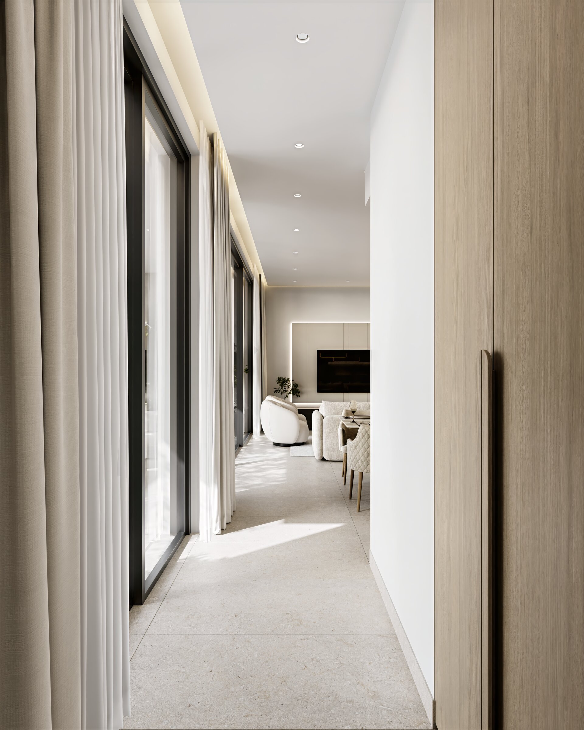 Lounge area with layered lighting and a refined, neutral material palette.