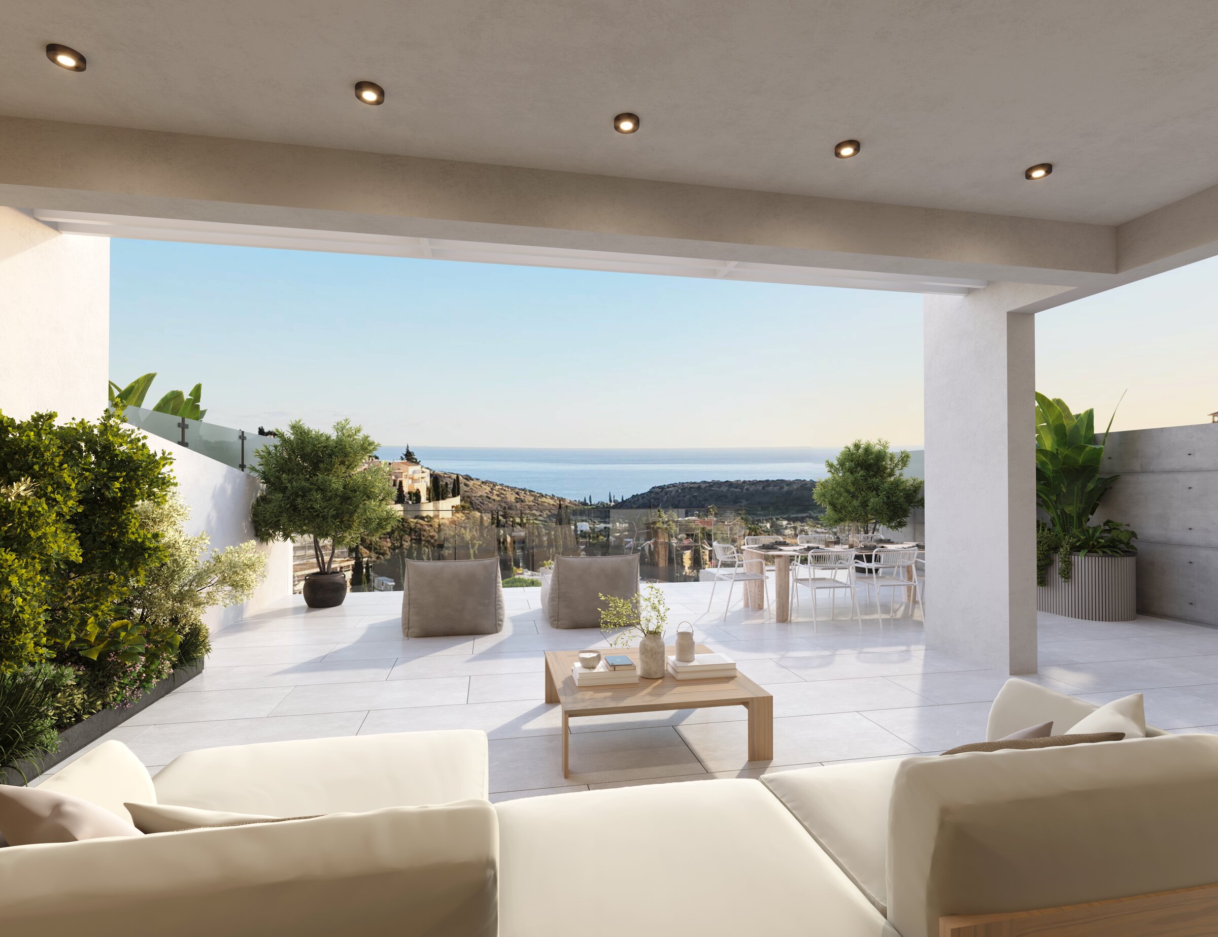 Covered veranda extending the living space toward the sea view.
